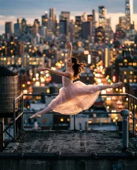 Ballerina leaping on sunset city roof