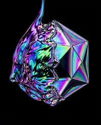 Iridescent liquid flowing over geometric crystal