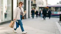 Young woman shopping in city street
