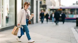 Young woman shopping in city street