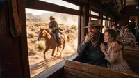 Western train passengers enjoying the view