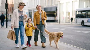 Happy family walking dog downtown