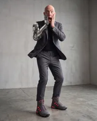 J.K. Simmons wearing cybernetic augmentations