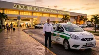 Taxi driver standing next to his unit, beautiful…