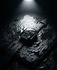 Apple Watch on wet slate surface