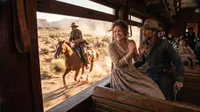 Frightened woman and armed man in train
