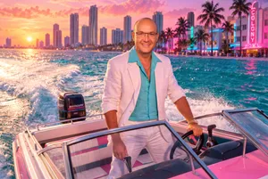 Man steering speed boat Miami sunset