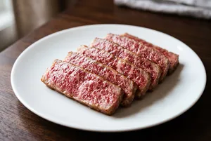 Five slices of marbled wagyu beef