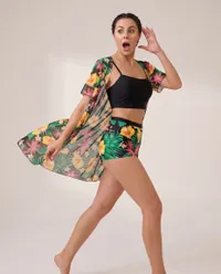 Surprised woman in floral tropical swimwear