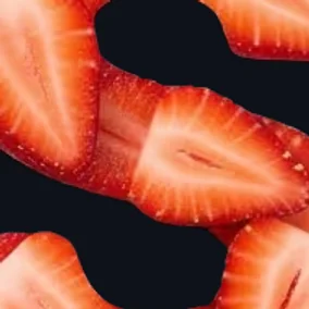 Sliced strawberries, close enough to see the seeds